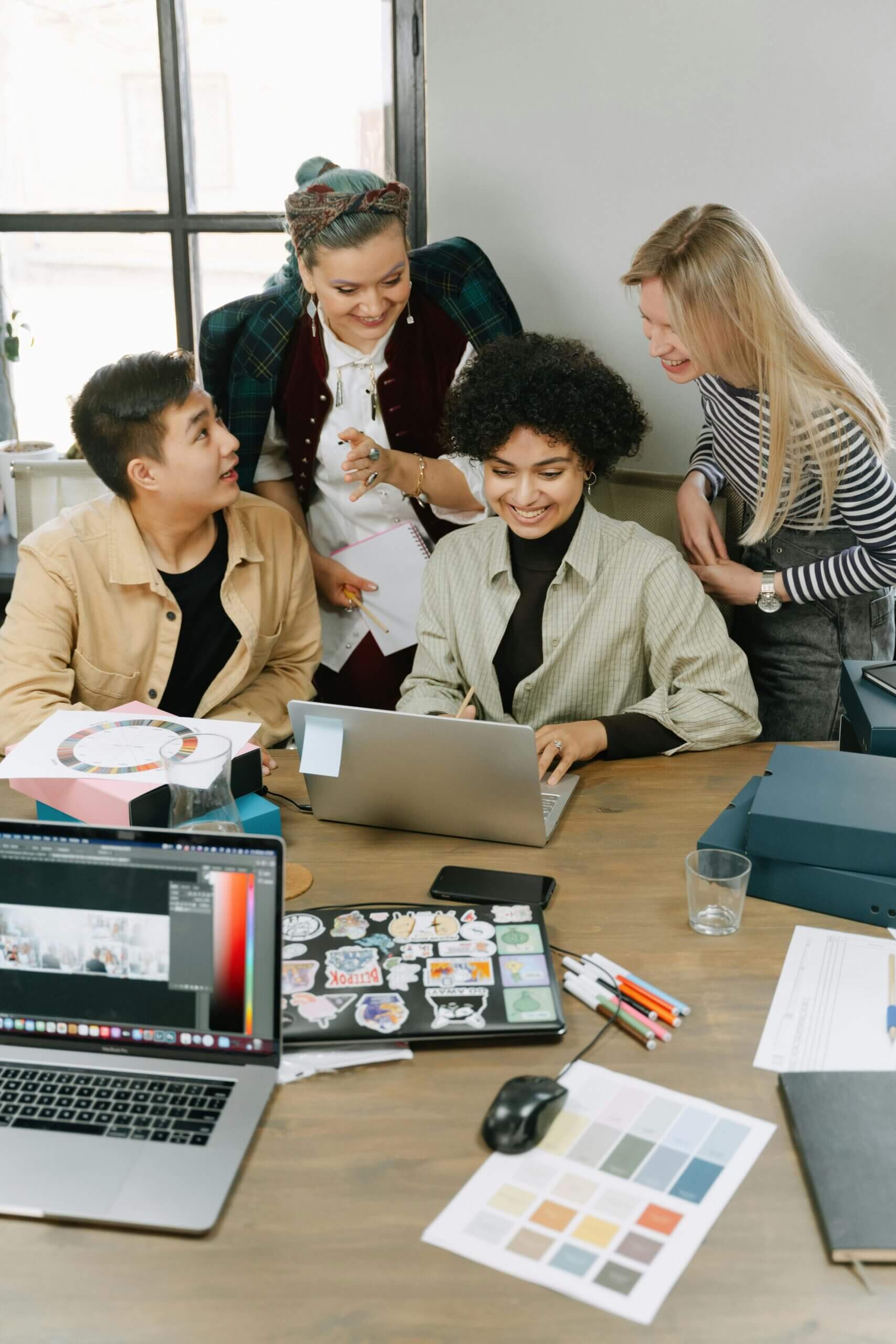 A small business team engaging in a training session, symbolizing employee development and its impact on business success.