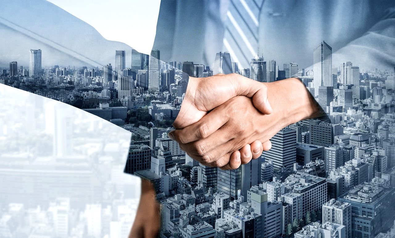 Business leader shaking hands to build trust and foster strong professional relationships.