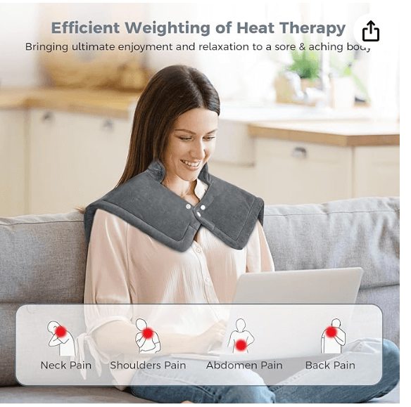 Entrepreneur using the NOWWISH Heating Pad while working on a project