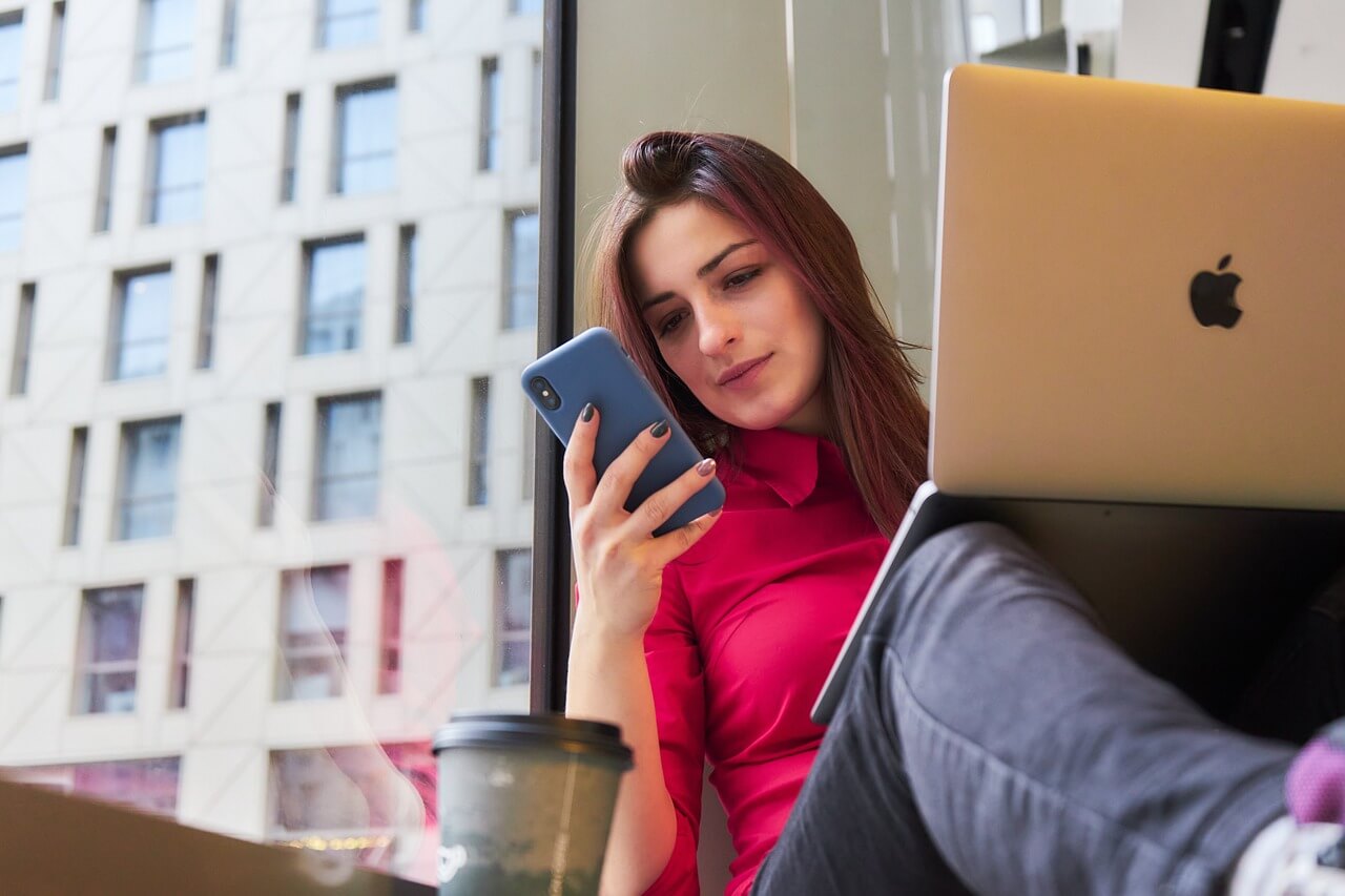 Freelancer working remotely using a laptop to stay productive in the gig economy